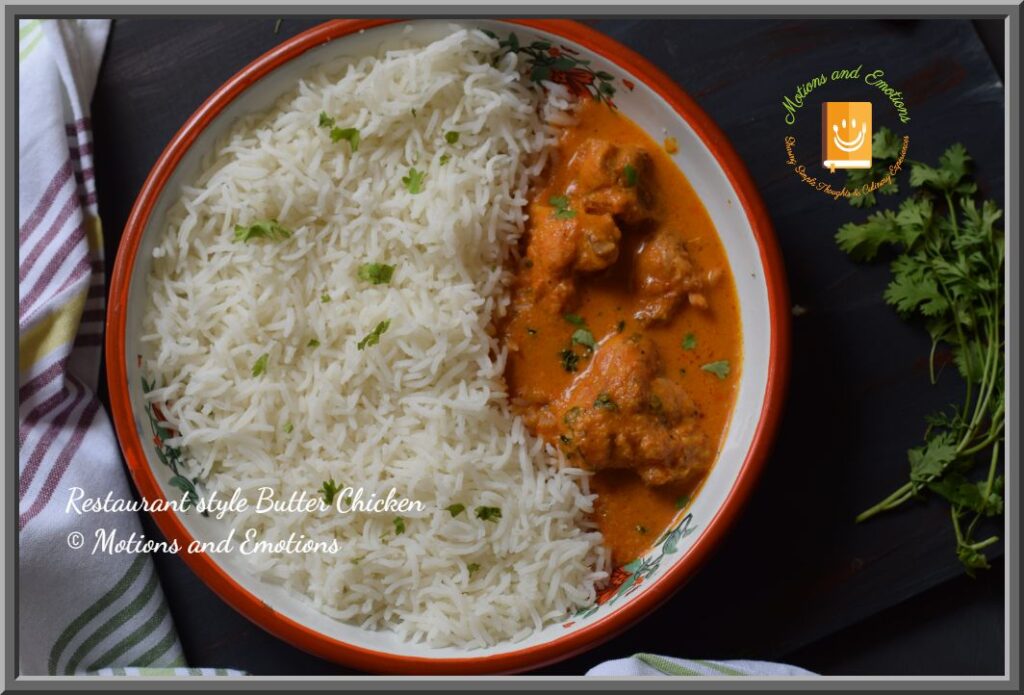 Butter Chicken and Rice in a white plate