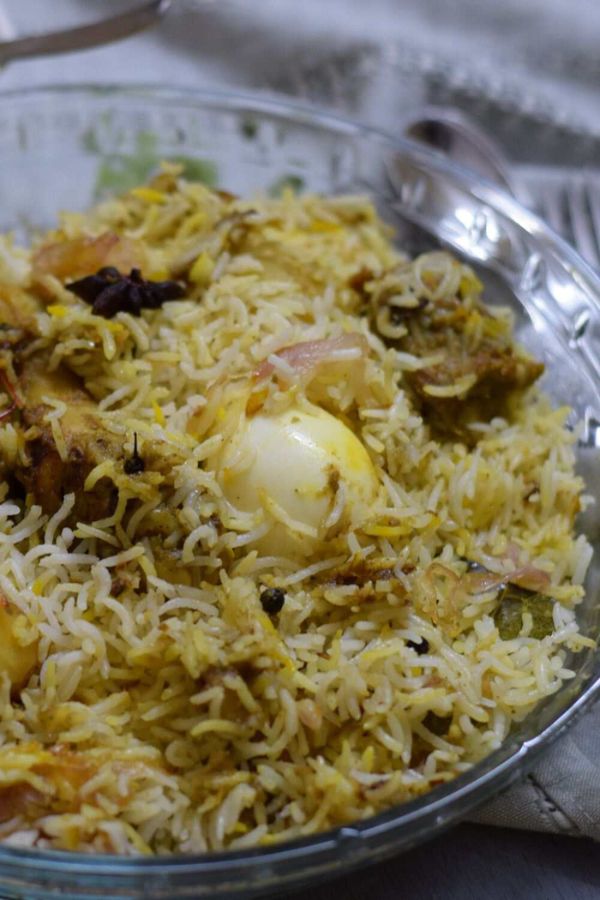 Kolkata chicken biryani in a glass plate