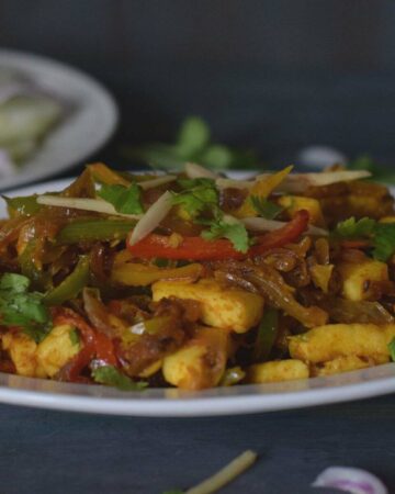 paneer jalfrezi in a white plate