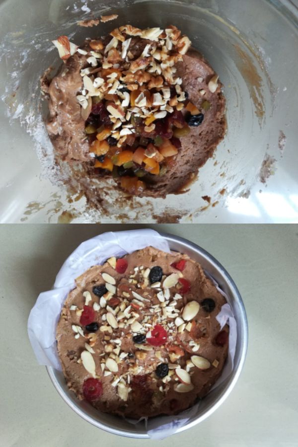 Adding soaked fruits and nuts in batter and pour batter in prepared tin