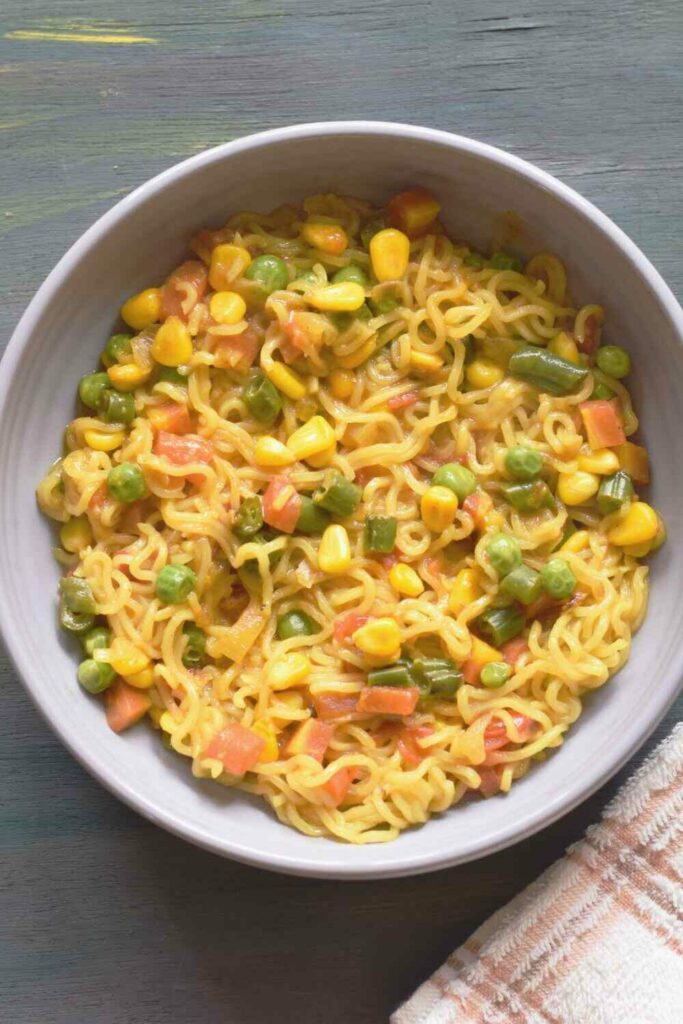 vegetable maggi in a grey bowl; top view