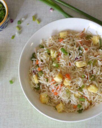 Paneer fried rice in a white bowl