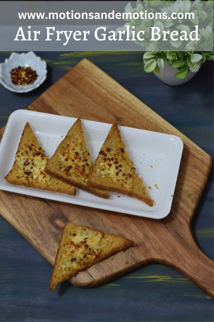 cheese garlic bread on wooden board