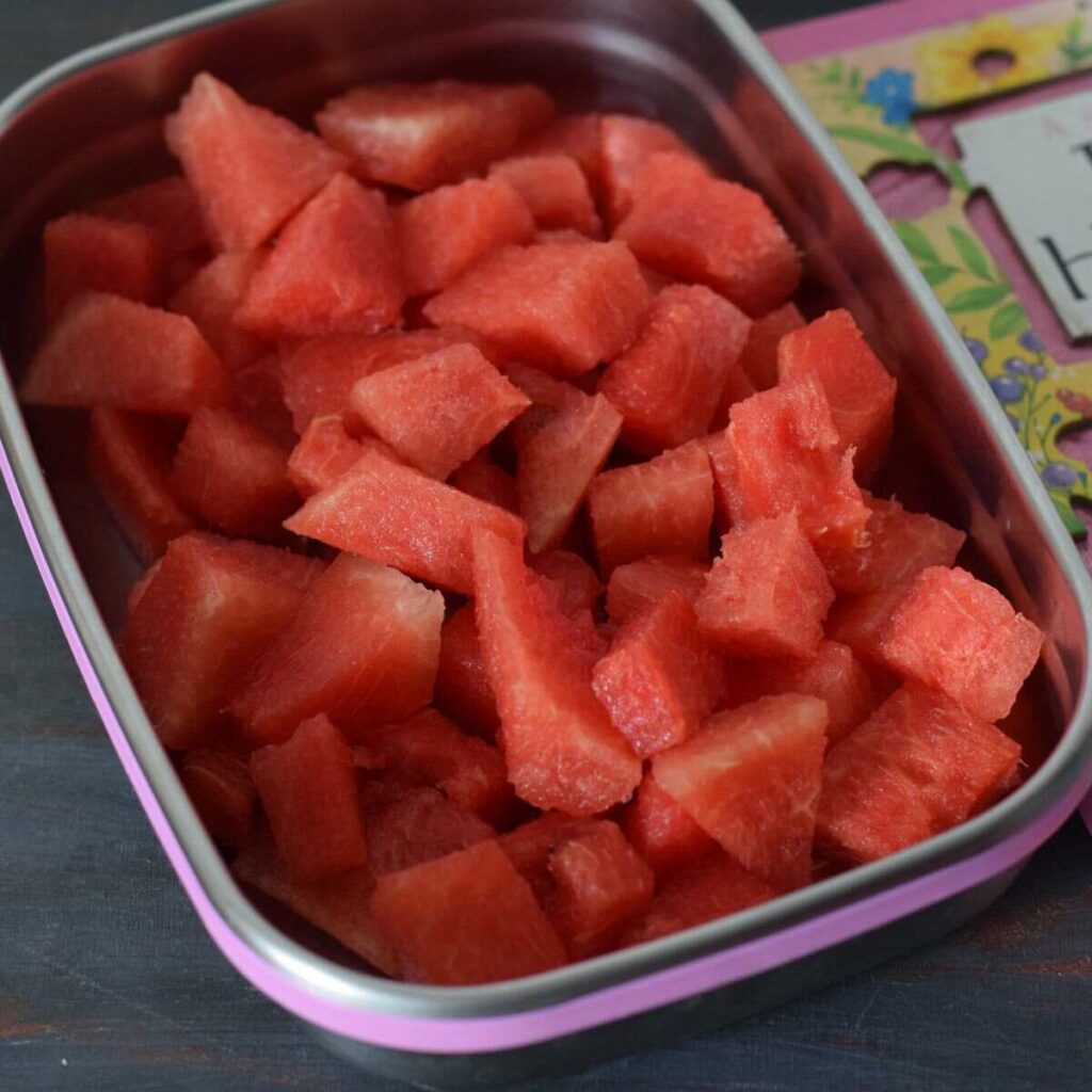 watermelon pieces in a steel tiffin box