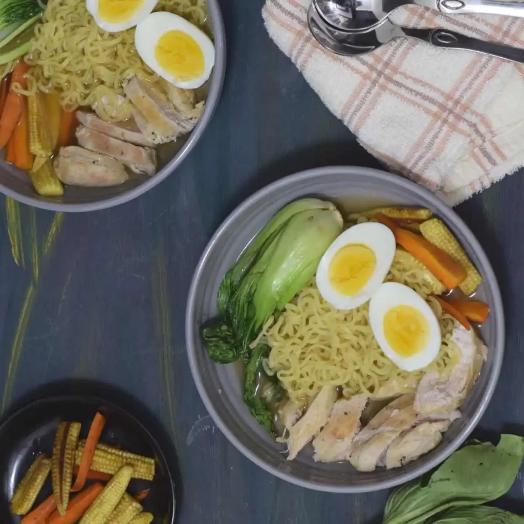 two bowls full of Bok choy ramen with vegetables