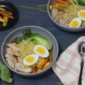 two bowls full of Bok choy ramen with vegetables