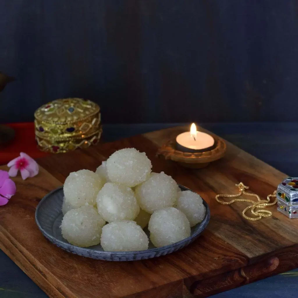 narkel naru in a plate along with diya and other decorative items
