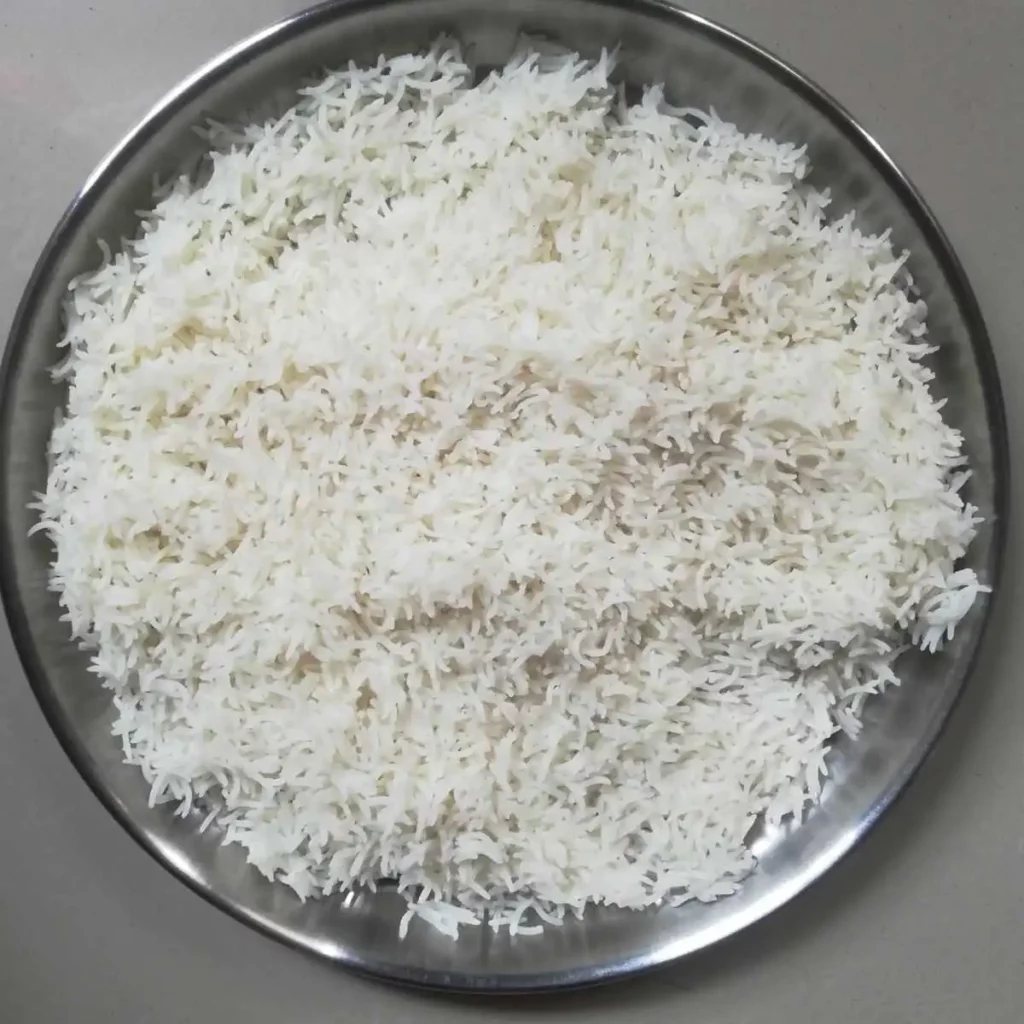 rice cooked and spread in a plate