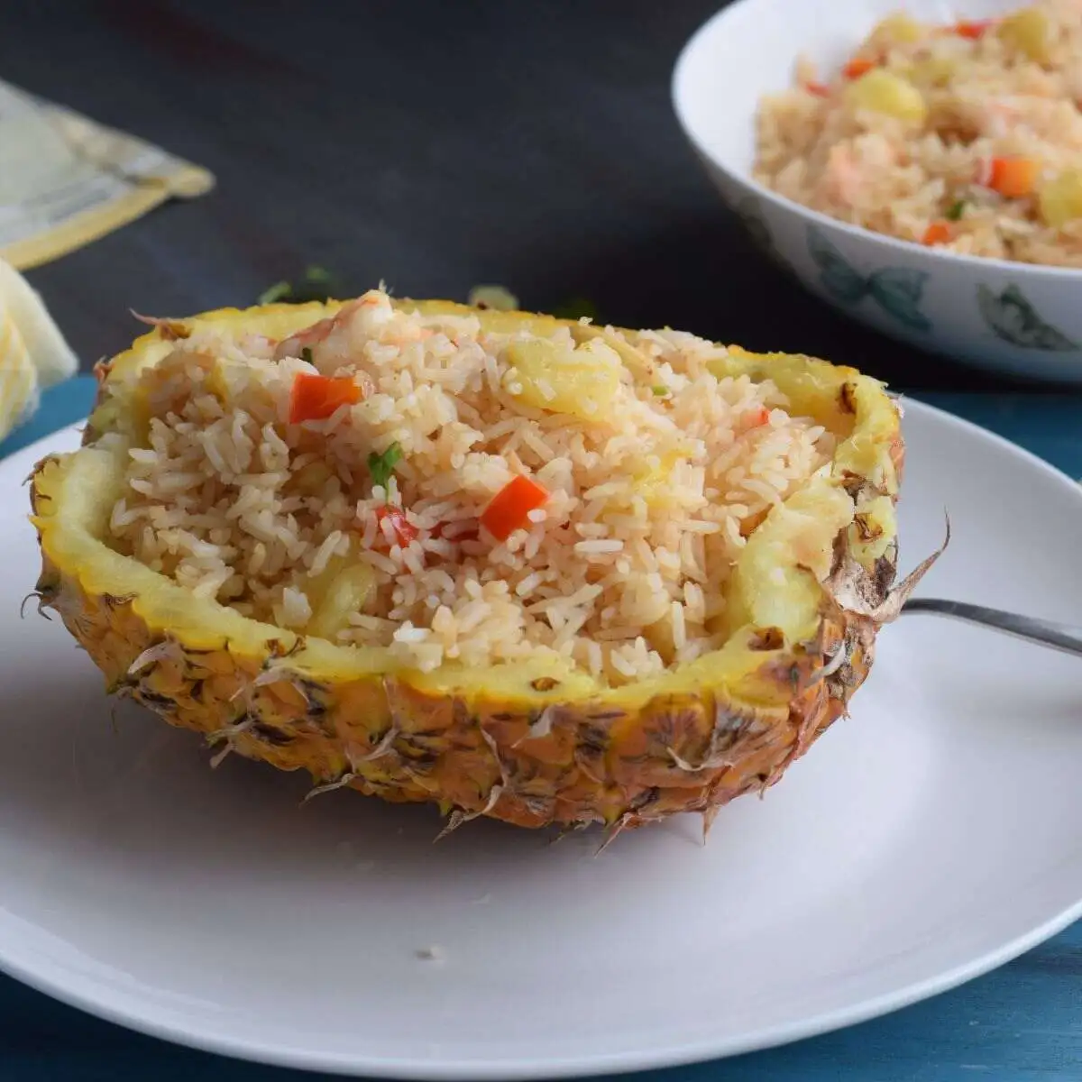 Thai pineapple fried rice served in pineapple shell
