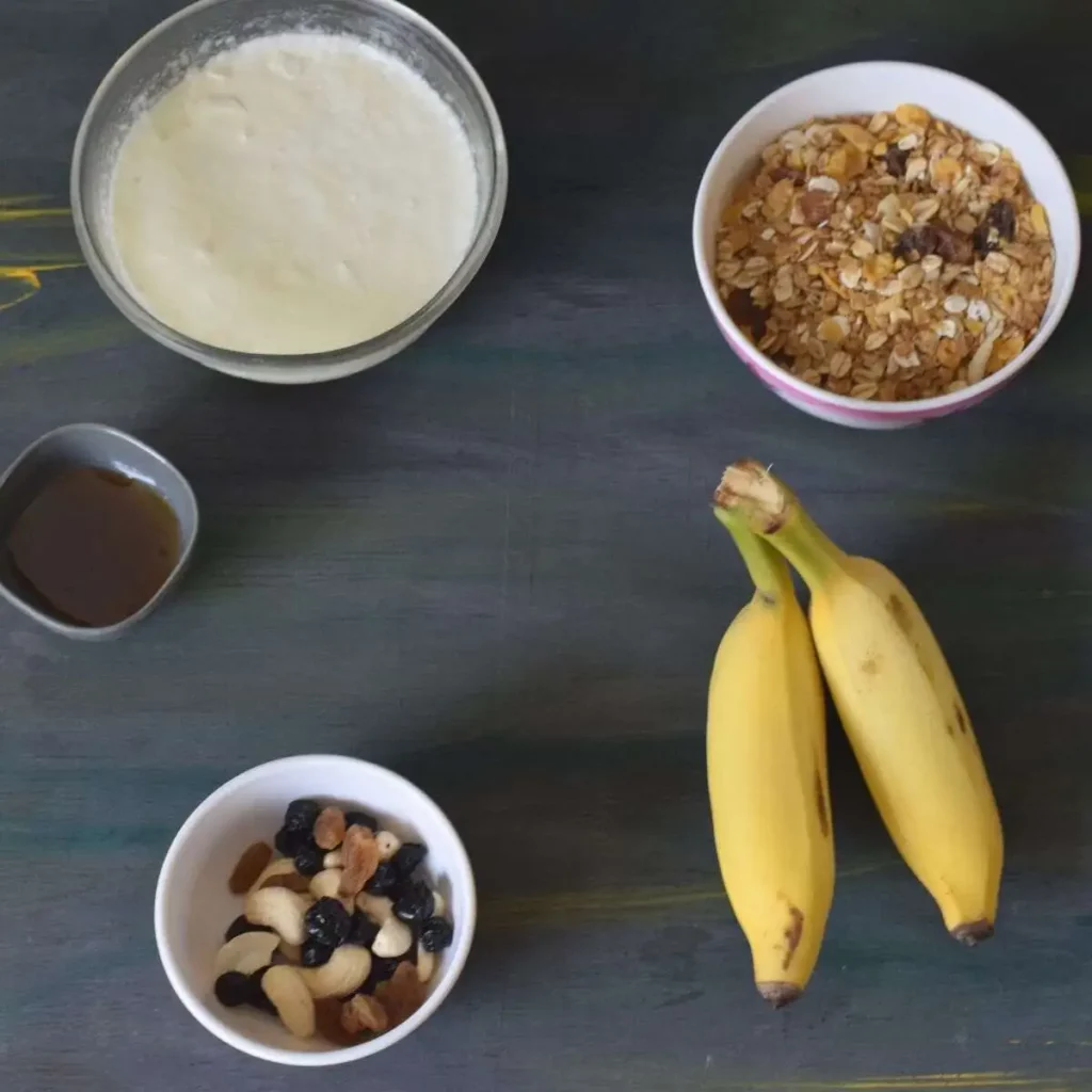 banana, dry fruits and nuts, muesli, yogurt and honey